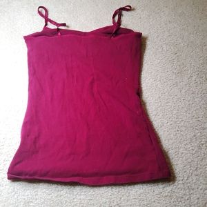 A crimson tank top with built in bra.
